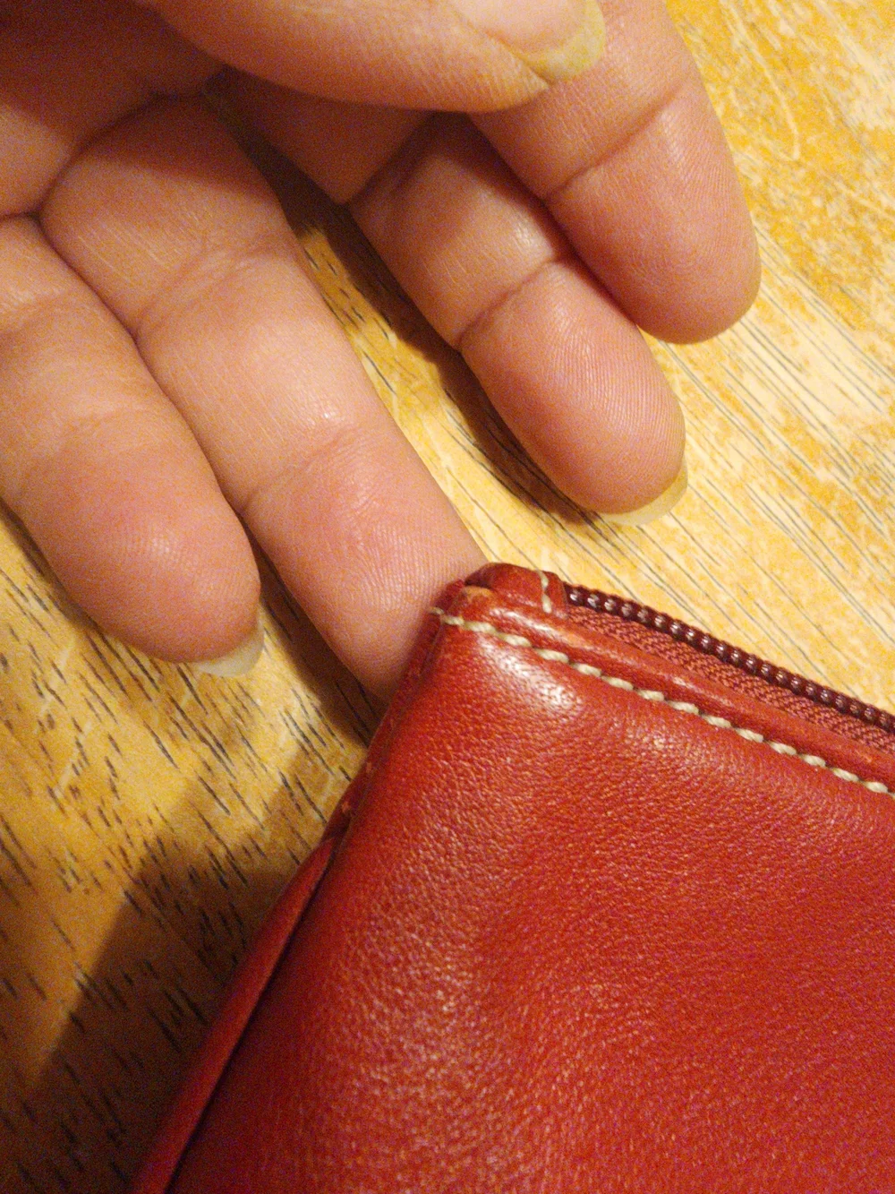 vintage Coach red leather Soho mini wristlet pouch featuring white contrast